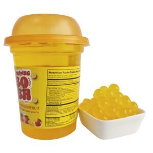 a cup of mango passion fruit flavor boba drink